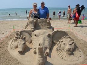 Sharon and Brian Nesbitt of Waterloo with their Sauble Safari creation at Sauble Sandfest August 9.