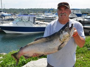 Scott Graham of Owen Sound with his 24.29-pound salmon he caught on Saturday, August 28, 2021. Graham took the lead at the 33rd annual Owen Sound Salmon Spectacular with the catch. The derby runs until Sept. 5.