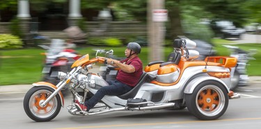 A decked out trike cruses down the street at the Friday the 13th festivities in Port Dover. 

(Mike Hensen/Postmedia Network)
