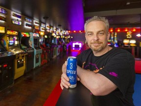 Evan Oswald in his new Arcade bar, named Tilt on Talbot Street just south of King Street in London. (Mike Hensen/The London Free Press)