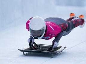 Belleville native Hallie Clarke is pictured mounting her sled in the skeleton competition at the 2020 Youth Olympic Games in St. Moritz, Switzerland. She is currently in Calagary and on becoming a member of CanadaÕs national team. PHOTO SUBMITTED.