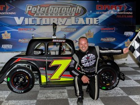 Opening the Canadian Legend Car Asphalt Nationals with a checkered flag, Matt Haufe (No. 7) scored the Ontario Legends Series win Saturday at Peterborough Speedway. MELISSA SMITS