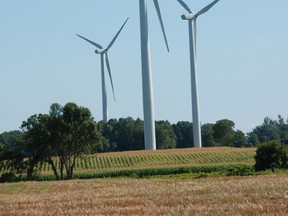 Towering wind turbines around Port Burwell, Ont., are part of a wind farm.