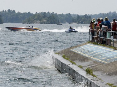 Spectators at Blockhouse Island watch the powerboaters depart. (RONALD ZAJAC/The Recorder and Times)