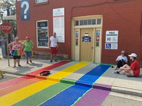Approximately 15 volunteers came out to help repaint the Pride crosswalk near downtown Gananoque after it had been defaced for the second time. Painting began at 10 a.m. on Monday and took roughly three hours to complete. (SUBMITTED PHOTO)