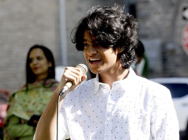 Savir Chanda, 15, sings during an event celebrating India's Independence Day on Brockville's Court House Green Sunday morning. (RONALD ZAJAC/The Recorder and Times)