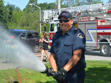 Brockville firefighters spray the willing crowd of youngsters and a few adults at the end of U5 soccer on Saturday, Aug. 14.
Tim Ruhnke/The Recorder and Times