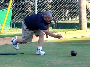 Duncan Smith, 77, took up lawn bowling 21 years ago shortly after retiring and he still enjoys the sport today. The past president of the Chatham Lawn Bowling Club is seen here playing in Chatham's Tecumseh Park on Aug. 4. Ellwood Shreve/Postmedia Network