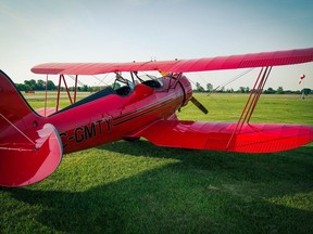 The Chatham-Kent chapter of the Canadian Owner and Pilots Association are offering a fortunate youngster a chance for a free flight in this WACO Biplane. Handout