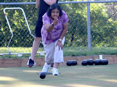 Jackie Choudhry lets a bowl go while playing Wednesday evening in Chatham. Ellwood Shreve/Chatham Daily News/Postmedia Network