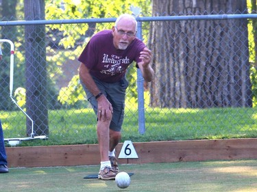 Long-time Chatham Lawn Bowling Club member Pete Cadotte delivers a bowl while playing in Chatham's Tecumseh Park on Wednesday. Ellwood Shreve/Chatham Daily News/Postmedia Network