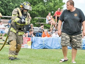 SDFES firefighters Les Crawford (left) and Bryan Holmes (right) run through a drill at the 2017 Ingleside firefighter competition. Activities like these will be part of the South Dundas Fire and Emergency Services Firefighter for a Day event on August 21 at Matilda Hall. (File photo) Phillip Blancher, Local Journalism Initiative Reporter