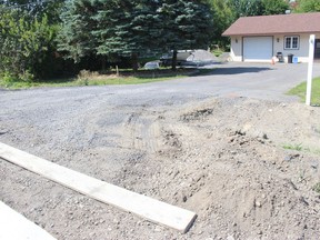 One of the driveways in St. Andrews West that was to become more narrow, with construction work well underway on County Road 18. Photo on Tuesday, August 24, 2021. Todd Hambleton/Cornwall Standard-Freeholder/Postmedia Network