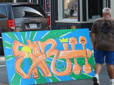 Checking out some colourful art in downtown Cornwall. Photo on Friday, August 27, 2021, in Cornwall, Ont. Todd Hambleton/Cornwall Standard-Freeholder/Postmedia Network