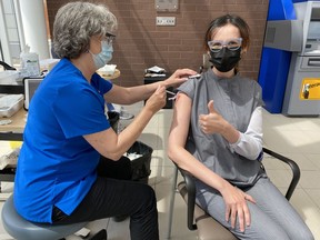 Handout/Cornwall Standard-Freeholder/Postmedia Network
Cornwall Community Hospital chief of medicine and intensivist Dr. Renee Givari receives her second dose of COVID-19 vaccine at the hospital in May 2021.