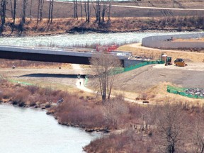 The town is considering hiring an outside consultant to help determine how to appropriately manage Jim Uffelmann Park and the pathway junction near the bridge. Patrick Gibson/Cochrane Times