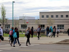 Students walk to Ecole McTavish on Monday, May 31, 2021. Laura Beamish/Fort McMurray Today/Postmedia Network