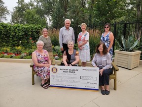 Top, from left to right: Photographer and Marketing Expert Cathy Bennington, Garden Tour planner Frank Van Donzel, Rotarian Joanne Van Donzel, Rotarian Alison Laycraft. Bottom, from left to right: Sheppard Family Park Director Mary Ann Dearing, Rotarian Orvella Small, Museum of the Highwood Director Curator Irene Kerr, (missing) Master Gardener Patricia Frostad.