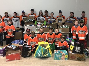 File photo of FMHA players collecting toiletries for the youth care kits Feb. 2020.