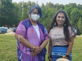 Assembly of First Nations national chief RoseAnne Archibald, left, met Saturday with Chippewas of Nawash Unceded First Nation Chief Veronica Smith during an event at the Cape Croker amphitheatre. SUPPLIED