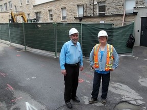 Tony O'Loughlin, president of the Kingston Irish Famine Commemoration Association, and ASI Heritage archeologist Katherine Hull at the site of the Irish burial site at Kingston General Hospital.
