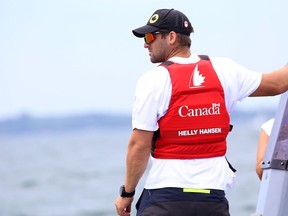 Two-time Canadian Olympic sailor Tom Ramshaw watches the races at the CORK International Regatta and Sail Canada Youth Championships (Laser and Laser Radial) in Kingston on Thursday.