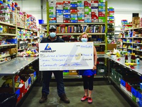 The Leduc & District Food Bank recently received a donation from Aspen Leaf Energy. (Lisa Berg)