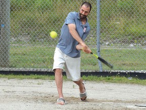 Photo by KEVIN McSHEFFREY/THE STANDARD
Adam Lamarre, Elliot Lake Red Wings assistant coach, took a few swings at the ball during a Elliot Lake Men’s Seniors Slo-Pitch practice on July 27.