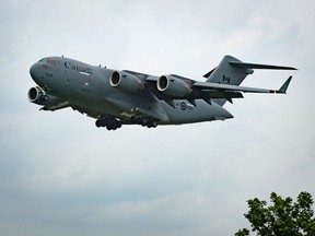 A Royal Canadian Air Force C-17 Globemaster roars in for a landing at Toronto Pearson International Airport in Torontoearlier this month. The military cargo plane was the second airlift mission evacuating Canadian Forces contracted interpreters out of Afghanistan.
Bryan Passifiume/Toronto Sun/Postmedia Network