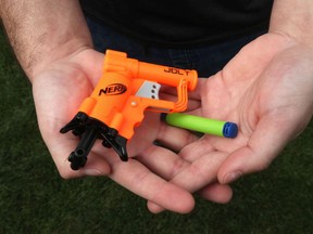 A mini Nerf gun got two teenagers arrested after they shot darts out of their car in a TikTok- inspired prank. Now, the SIU is investigating.