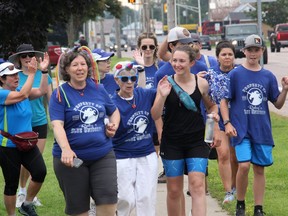 Ruby Pilatzke (front right), her mother Julie (front left) and grandmother Lilly Donnelly (front centre) begin the final stretch from Pembroke to Petawawa of Pilatzke's 100-kilometre, non-stop trek from Arnprior to Petawawa in support of JDRF.