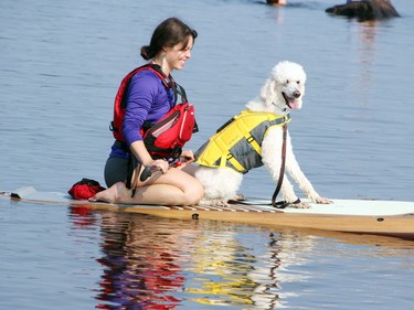 Elizabeth Verhulp and her pup Sudan are all smiles as they get ready to try paddleboarding for the first time during the Ontario SPCA Renfrew County Animal Care Centre Doggy Paddle fundraiser at the Petawawa Point Aug. 21.