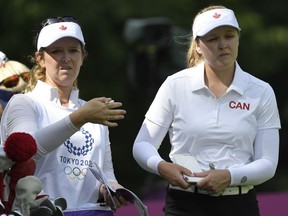 Brittany and Brooke Henderson during the opening round of the women's golf competition at the Tokyo Olympics.
REUTERS/Toby Melville
