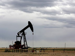 An oil and gas pump jack is seen near Granum, Alberta, Canada on May 6, 2020. REUTERS/Todd Korol/File