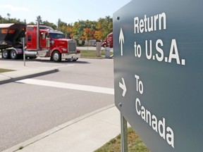 A truck leaves the Canada-United States border crossing at the Thousand Islands Bridge in Lansdowne, Ont., Sept. 28, 2020. REUTERS/Lars Hagberg