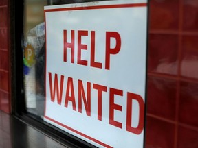 A help wanted sign is seen in this file photo.
REUTERS/Mike Blake/File Photo ORG XMIT: FW1
