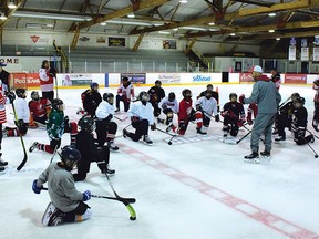 Photo by KEVIN McSHEFFREY/THE STANDARD
Adam Lamarre, Elliot Lake Red Wings assistant coach, was training young hockey players in the youth hockey camp at the Centennial Arena last week, with some help from some of the Elliot Lake Red Wings players.