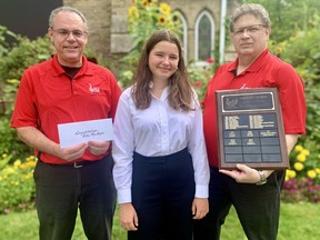 Ella McBoyle was named the 2021 Mervin Doerr Memorial Scholarship recipient. Also pictured are Laurence Gauci, Stratford Concert Band conductor, left, and Allan Lee, Stratford Concert Band president.