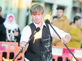 Busker Max Warren performs in Sault Ste. Marie, Ont., on Thursday, Aug. 8, 2019. POSTMEDIA