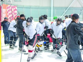 BRICK AND BEAVERS Blind River Beavers coach Kyle Brick gives instruction to a group of players at the Northern Ontario Jr. Hockey League team's recent camp at John Rhodes Community Center in Sault Ste. Marie. BOB DAVIES/SAULT THIS WEEK