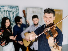 Shane Cook and The Woodchippers are set to release an album in October and they've filmed a concert with the International Symphony Orchestra that will soon be available online.