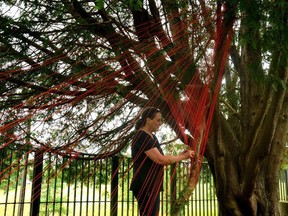 Métis artist Tracey-Mae Chambers installs her exhibit, Hope and Healing, outside Gallery Stratford in July. On Monday, Chambers installed another exhibit at the Port Dover Harbour Museum. Galen Simmons/Postmedia Network