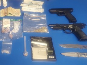 Norfolk OPP seized drugs, weapons and cash after police stopped a vehicle on Evergreen Hill Road in Simcoe in August. Three people are facing charges.