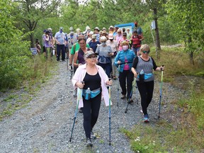 About 50 people, separated into two groups, participated in a walking exploration of Laurentian University's green space and trails in Sudbury, Ont. on Thursday August 5, 2021. The event, hosted by Coalition for a Liveable Sudbury, held the event to make community members aware of the importance of the greenspace and trail system at Laurentian, and why the land should be protected and not sold off. John Lappa/Sudbury Star/Postmedia Network
