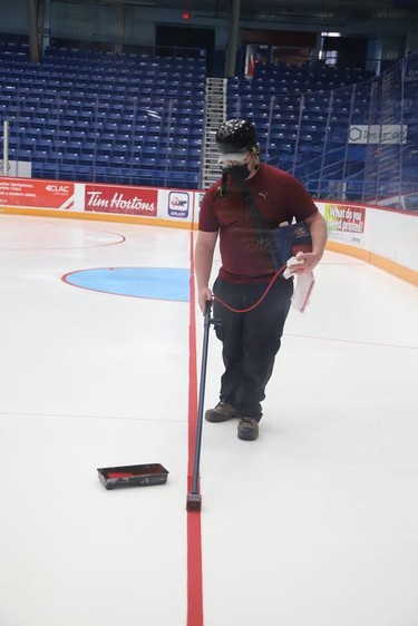 Lines were painted and the Sudbury Wolves logo was added as the ice surface started to take shape at the Sudbury Community Arena in Sudbury, Ont. on Friday August 6, 2021. John Lappa/Sudbury Star/Postmedia Network