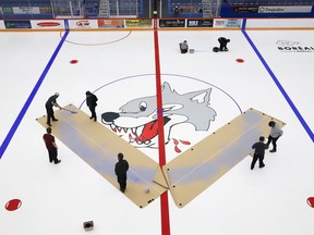 Lines were painted and the Sudbury Wolves logo was added as the ice surface started to take shape at the Sudbury Community Arena on Aug. 6, 2021.