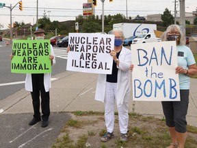 Dr. Richard Denton, left, Elizabeth Denton and Audrey Anderson take part in a rally to raise awareness of the Fossil Fuel Non-Proliferation Treaty and the UN Treaty on the Prohibition of Nuclear Weapons in Sudbury, Ont. on Friday August 6, 2021.  Fridays For Future Sudbury and the Sudbury Chapter of the International Physicians for the Prevention of Nuclear War joined forces to host the event on the 76th anniversary of the nuclear bombing of Hiroshima Japan. John Lappa/Sudbury Star/Postmedia Network