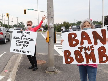 Participants take part in a rally to raise awareness of the Fossil Fuel Non-Proliferation Treaty and the UN Treaty on the Prohibition of Nuclear Weapons in Sudbury, Ont. on Friday August 6, 2021.  Fridays For Future Sudbury and the Sudbury Chapter of the International Physicians for the Prevention of Nuclear War joined forces to host the event on the 76th anniversary of the nuclear bombing of Hiroshima Japan. John Lappa/Sudbury Star/Postmedia Network