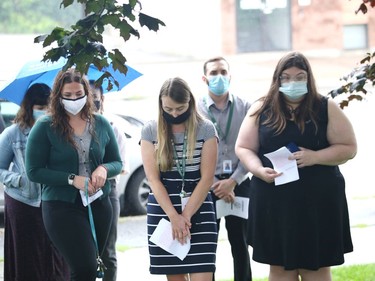 Participants take part in a moment of silence at a Prisoners' Justice Day commemoration ceremony in Sudbury, Ont. on Tuesday August 10, 2021. Prisoners' Justice Day is held to remember men and women who have died unnatural and violent deaths while incarcerated in prisons and penitentiaries. John Lappa/Sudbury Star/Postmedia Network