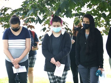 Participants take part in a moment of silence at a Prisoners' Justice Day commemoration ceremony in Sudbury, Ont. on Tuesday August 10, 2021. Prisoners' Justice Day is held to remember men and women who have died unnatural and violent deaths while incarcerated in prisons and penitentiaries. John Lappa/Sudbury Star/Postmedia Network